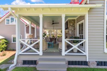 exterior space with ceiling fan