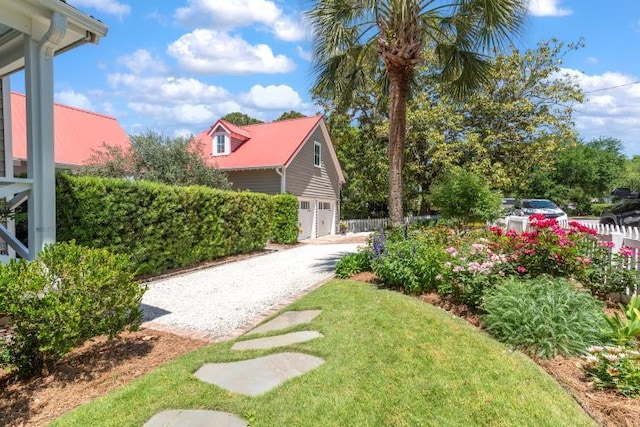 view of yard with a garage