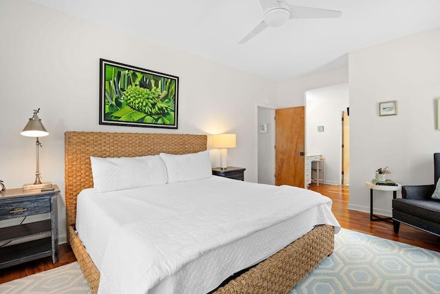 bedroom featuring hardwood / wood-style flooring and ceiling fan