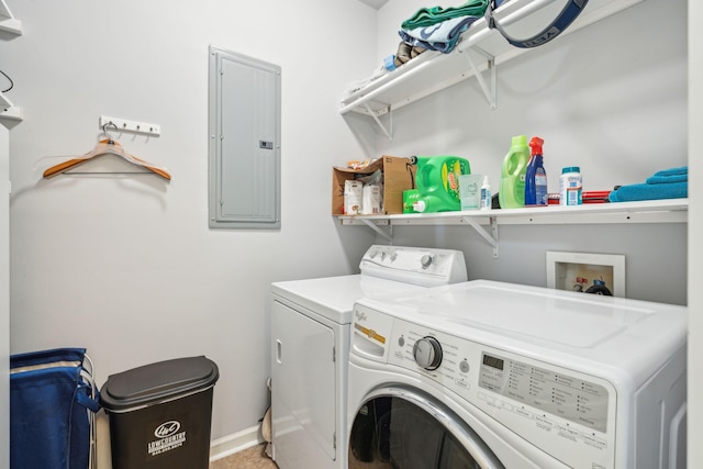 clothes washing area featuring washer and dryer and electric panel