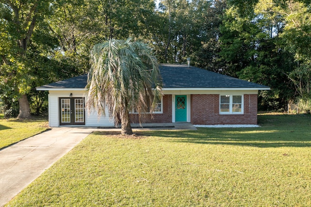 ranch-style home with a front yard