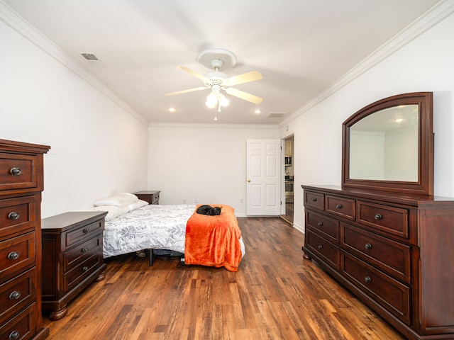 bedroom featuring ceiling fan, ornamental molding, and dark wood-type flooring