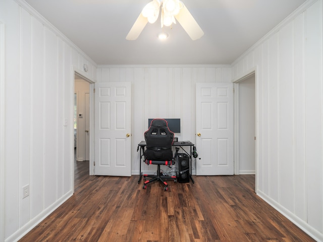 home office featuring crown molding, dark hardwood / wood-style flooring, and ceiling fan