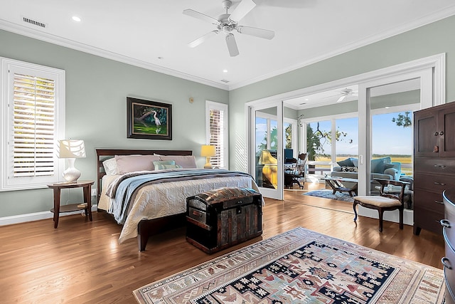 bedroom with crown molding, ceiling fan, hardwood / wood-style floors, and access to outside