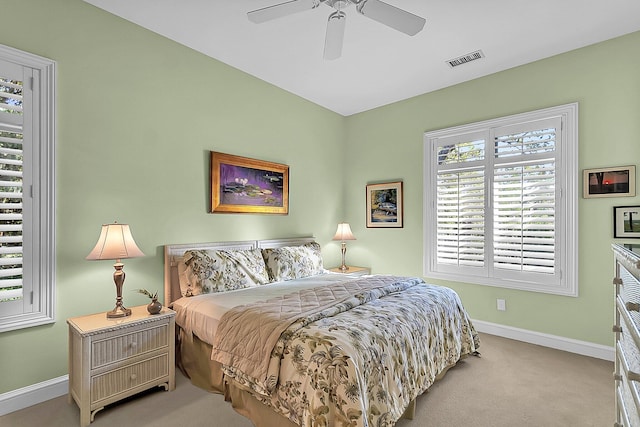 carpeted bedroom featuring ceiling fan