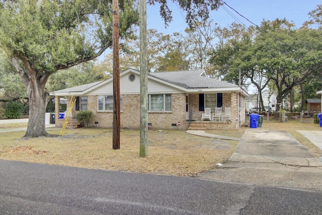 single story home featuring covered porch