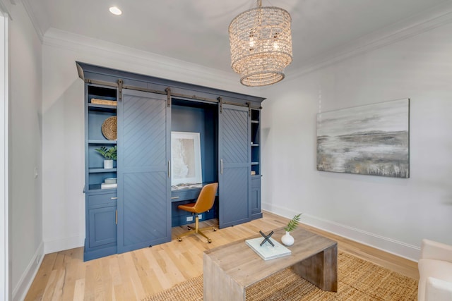 home office featuring a notable chandelier, ornamental molding, light wood-type flooring, and baseboards