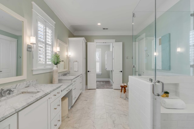 bathroom featuring vanity, visible vents, marble finish floor, a shower stall, and crown molding