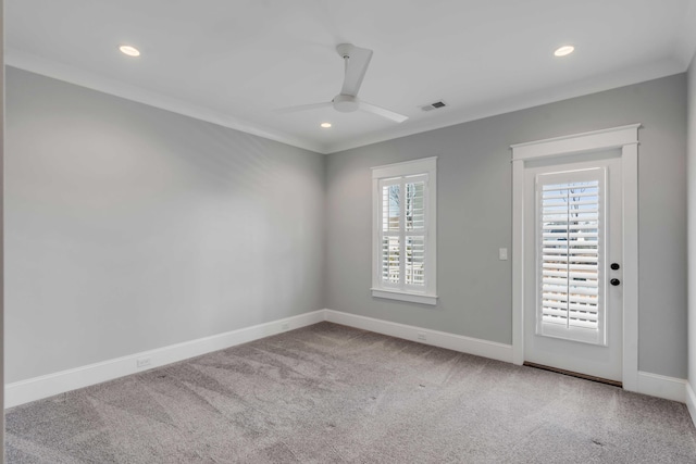 spare room with carpet, recessed lighting, visible vents, a ceiling fan, and baseboards