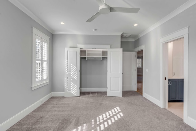 unfurnished bedroom with carpet, ornamental molding, and baseboards