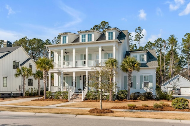 view of front of home featuring a balcony, covered porch, a ceiling fan, and roof with shingles