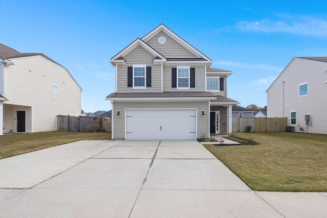 view of front of property featuring a garage and a front lawn