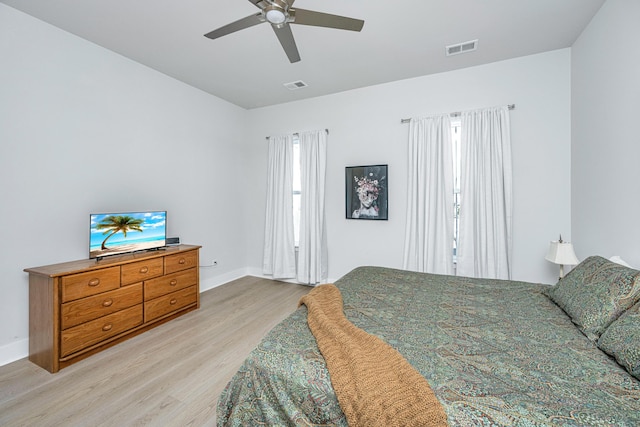 bedroom featuring light wood-type flooring and ceiling fan