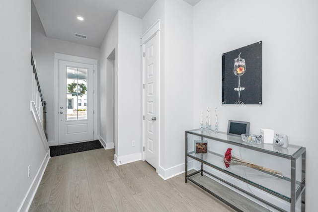 entrance foyer featuring light wood-type flooring