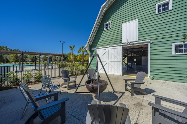 view of patio featuring a pergola