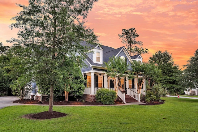 2720 Oak Manor Dr, Mount Pleasant, SC 29466 - cape cod home featuring covered porch and a front yard
