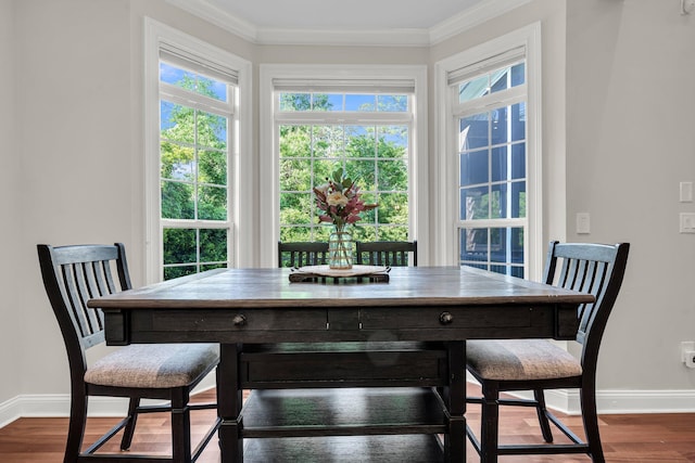 2720 Oak Manor Dr, Mount Pleasant, SC 29466 - dining area featuring baseboards, healthy amount of natural light, ornamental molding, and wood finished floors