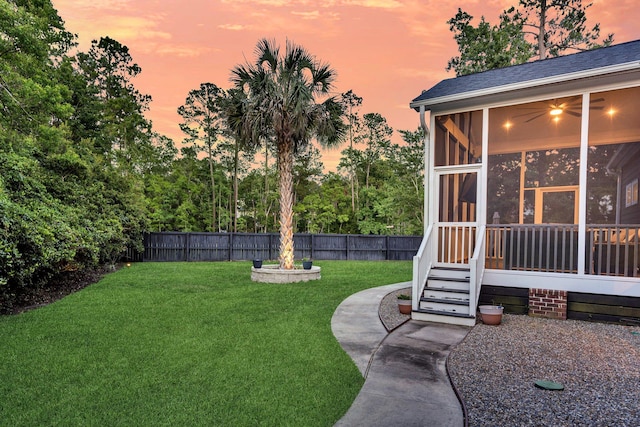 2720 Oak Manor Dr, Mount Pleasant, SC 29466 - yard at dusk featuring a sunroom