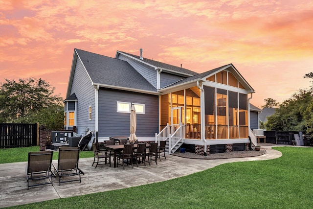 2720 Oak Manor Dr, Mount Pleasant, SC 29466 - back of property with a sunroom, a patio area, and roof with shingles