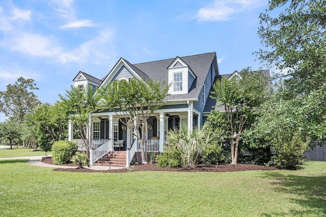 2720 Oak Manor Dr, Mount Pleasant, SC 29466 - new england style home with covered porch, a front lawn, and a shingled roof