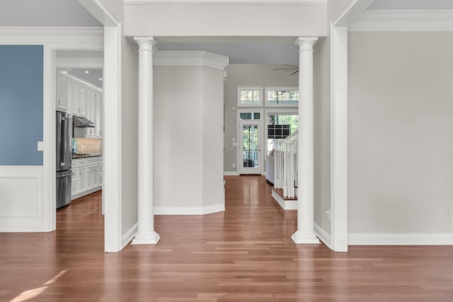 2720 Oak Manor Dr, Mount Pleasant, SC 29466 - entryway with wood finished floors, ornate columns, baseboards, ceiling fan, and crown molding
