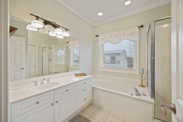 bathroom with vanity, crown molding, plenty of natural light, and tile patterned floors