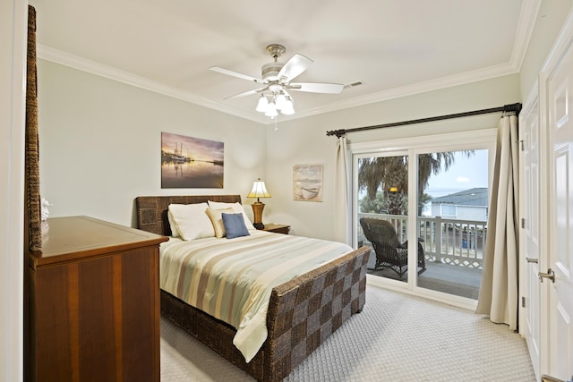 carpeted bedroom with ceiling fan, ornamental molding, and access to exterior