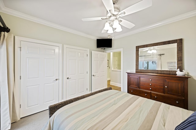 bedroom featuring crown molding and ceiling fan