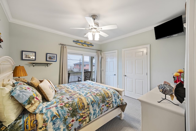 bedroom with ornamental molding, carpet floors, and access to outside