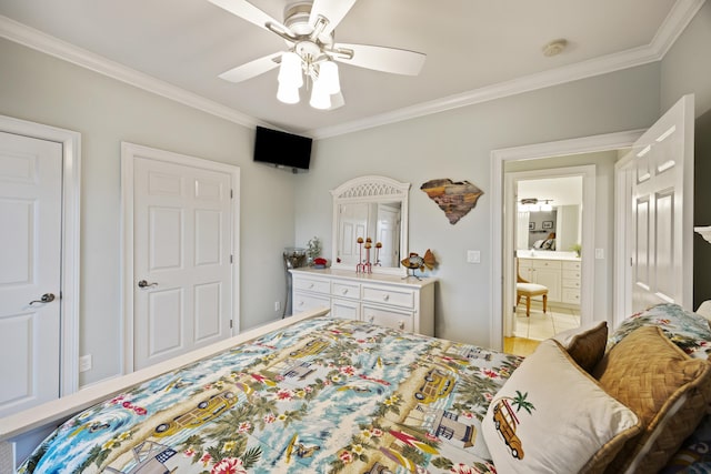 bedroom with ornamental molding and ceiling fan