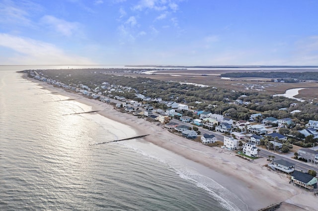 aerial view featuring a water view and a beach view