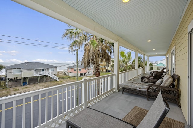 view of patio featuring a porch