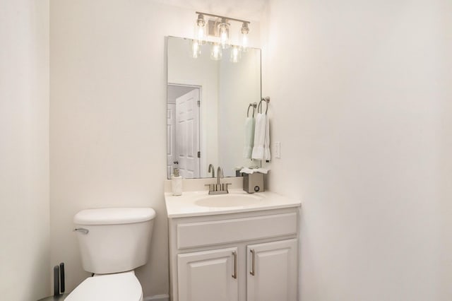 half bath with toilet and vanity