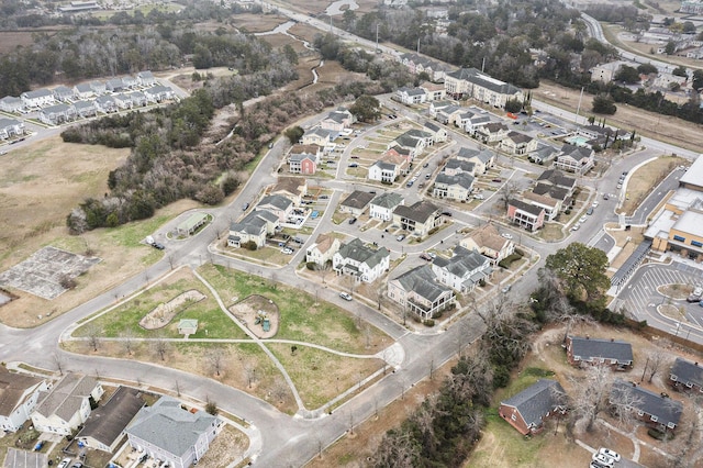 birds eye view of property with a residential view