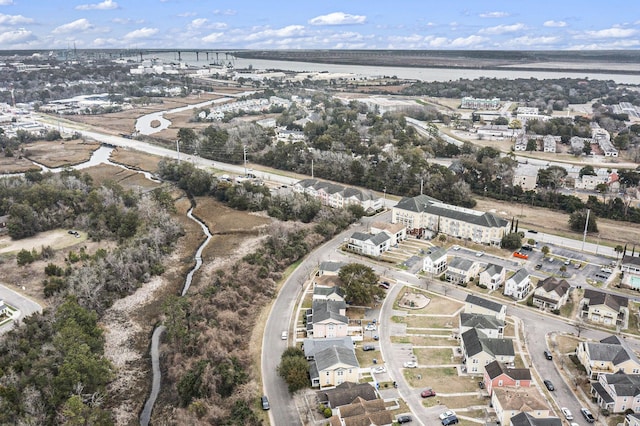 aerial view with a water view and a residential view