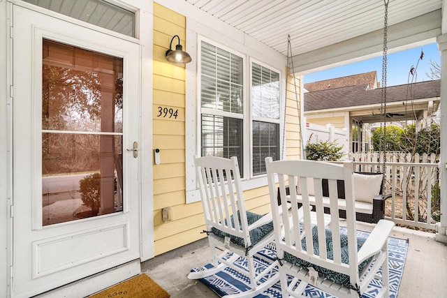 doorway to property with a porch