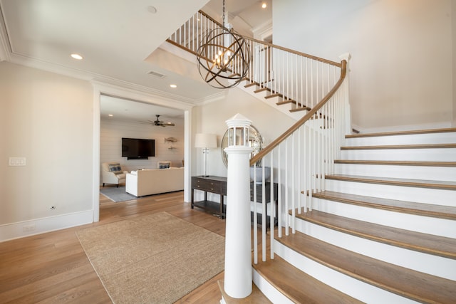 3803 Palm Blvd, Isle Of Palms, SC 29451 - staircase featuring wood finished floors, ornamental molding, recessed lighting, baseboards, and ceiling fan
