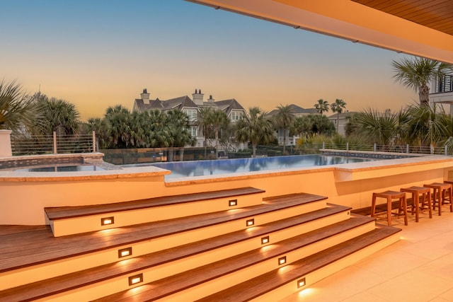 3803 Palm Blvd, Isle Of Palms, SC 29451 - pool at dusk featuring a bar