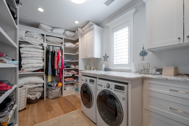 3803 Palm Blvd, Isle Of Palms, SC 29451 - laundry room with cabinet space, separate washer and dryer, light wood-style floors, and recessed lighting