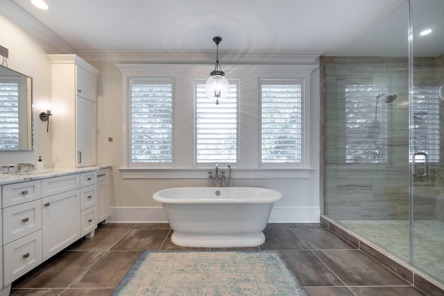3803 Palm Blvd, Isle Of Palms, SC 29451 - bathroom with a shower stall, baseboards, vanity, plenty of natural light, and ornamental molding