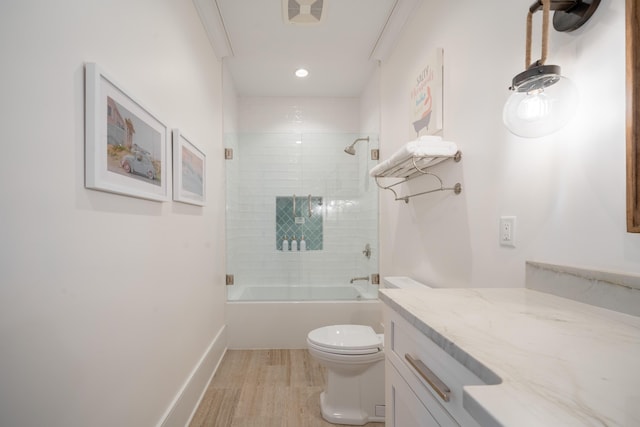 3803 Palm Blvd, Isle Of Palms, SC 29451 - full bath with toilet, wood finished floors, vanity, bath / shower combo with glass door, and recessed lighting