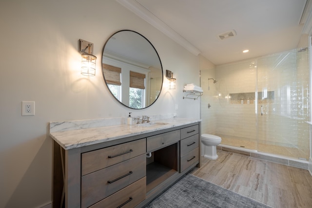 3803 Palm Blvd, Isle Of Palms, SC 29451 - bathroom featuring toilet, a shower stall, vanity, wood finished floors, and crown molding
