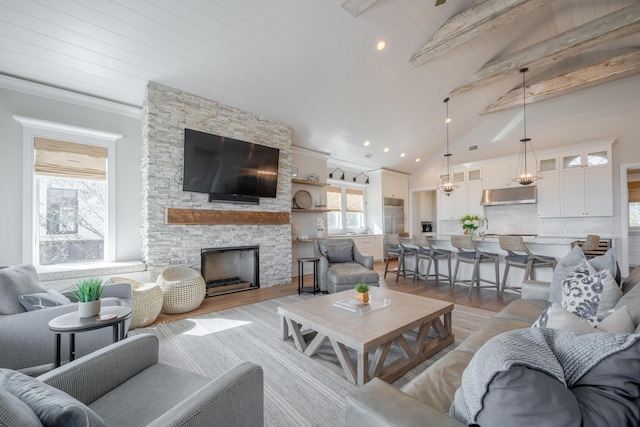 3803 Palm Blvd, Isle Of Palms, SC 29451 - living area with a stone fireplace, wood finished floors, and wood ceiling