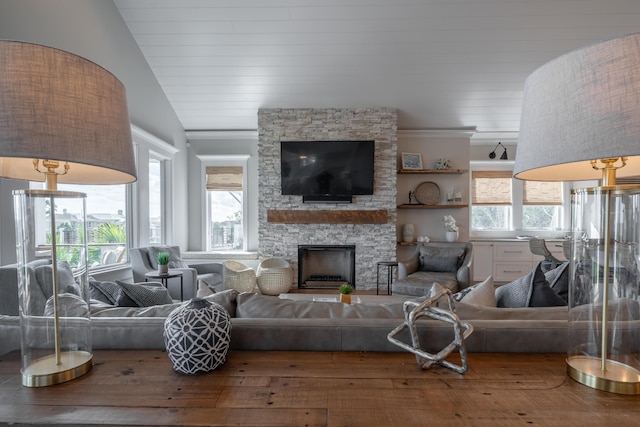 3803 Palm Blvd, Isle Of Palms, SC 29451 - living area with wood-type flooring, a fireplace, and lofted ceiling