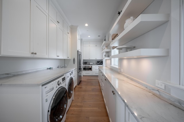 3803 Palm Blvd, Isle Of Palms, SC 29451 - laundry area featuring washing machine and dryer, light wood-style flooring, and recessed lighting