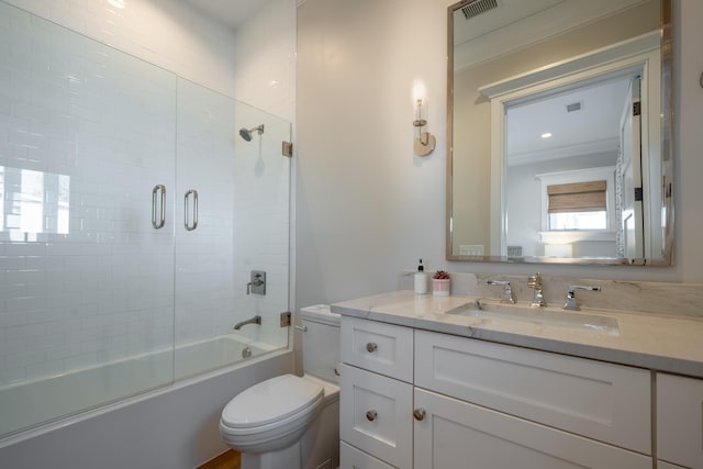 3803 Palm Blvd, Isle Of Palms, SC 29451 - full bathroom featuring toilet, shower / bath combination with glass door, and vanity