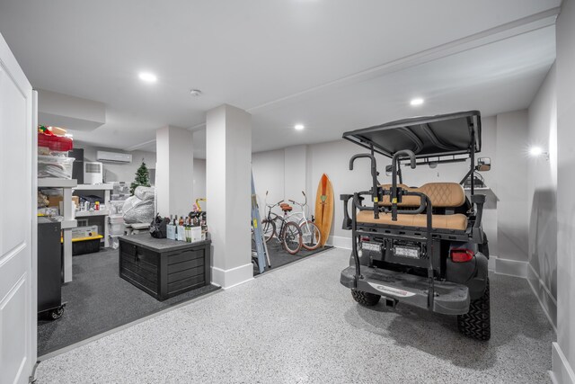 3803 Palm Blvd, Isle Of Palms, SC 29451 - workout area featuring an AC wall unit, recessed lighting, and baseboards