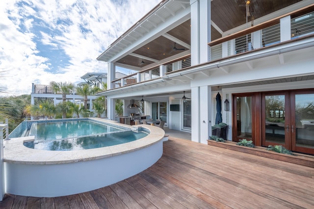 3803 Palm Blvd, Isle Of Palms, SC 29451 - swimming pool with ceiling fan, a deck, and french doors