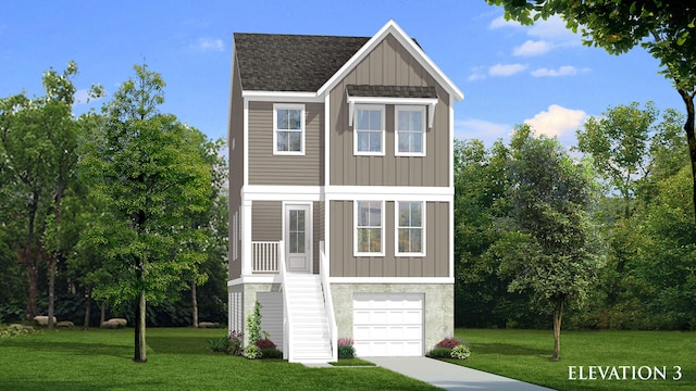 view of front of house with a front yard and a garage