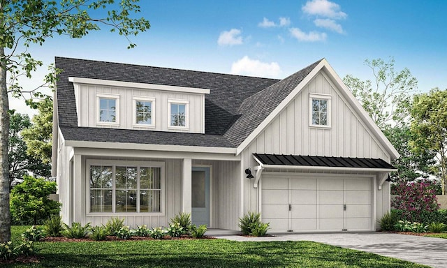 view of front of house with a front lawn and a garage